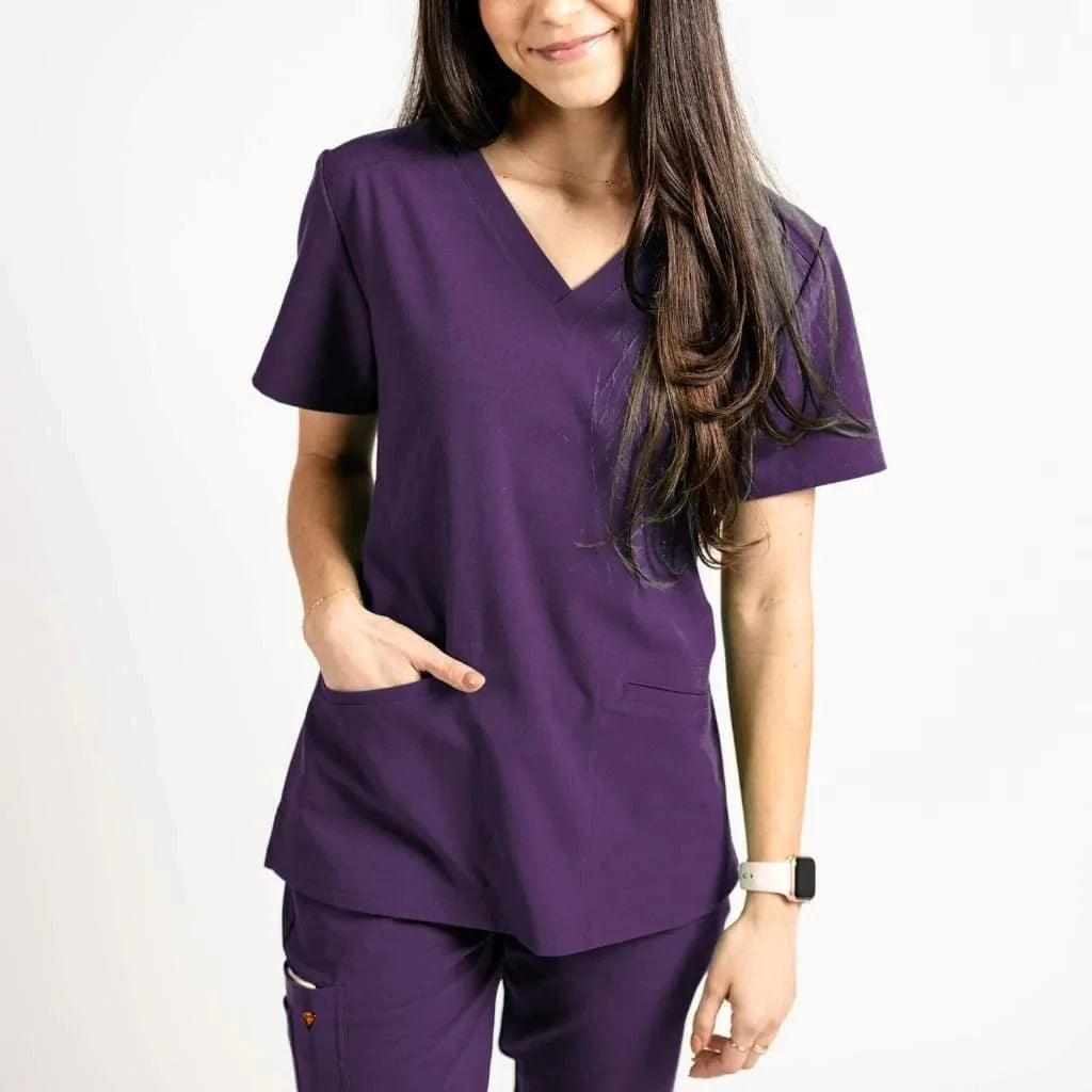 Close up standing photo of purple scrubs.