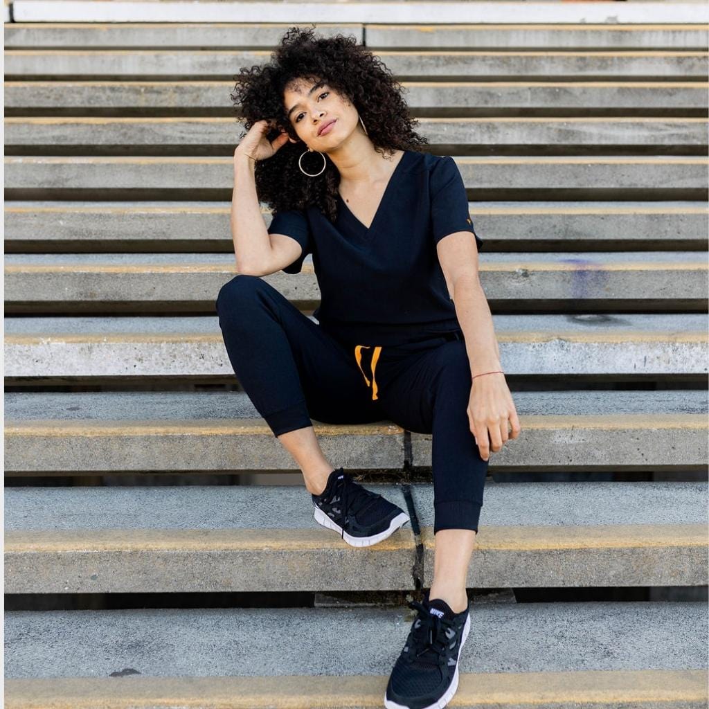 womens jogger scrubs in black. flattering and sporty fit. Medical scrubs for women