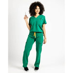 Full body picture of the the Bodie scrub pants in hunter green.