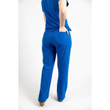 Backside close up body picture of the the Bodie scrub pants in royal blue.