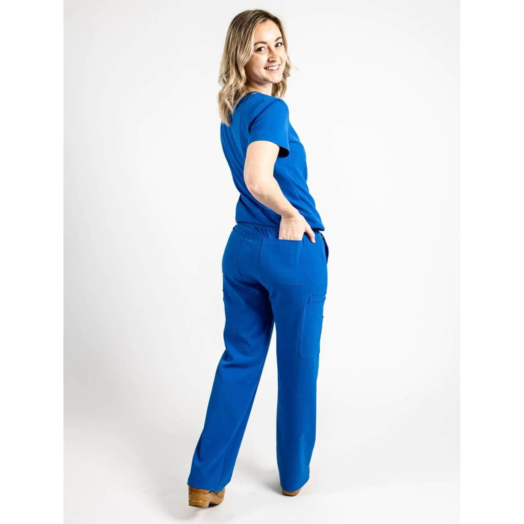 Backside picture of the the Bodie scrub pants in royal blue.