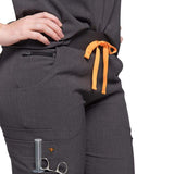 Lower front close up picture of the the Pfeiffer scrub pants in charcoal gray.