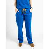 Full body picture of the the Bodie scrub pants in royal blue.