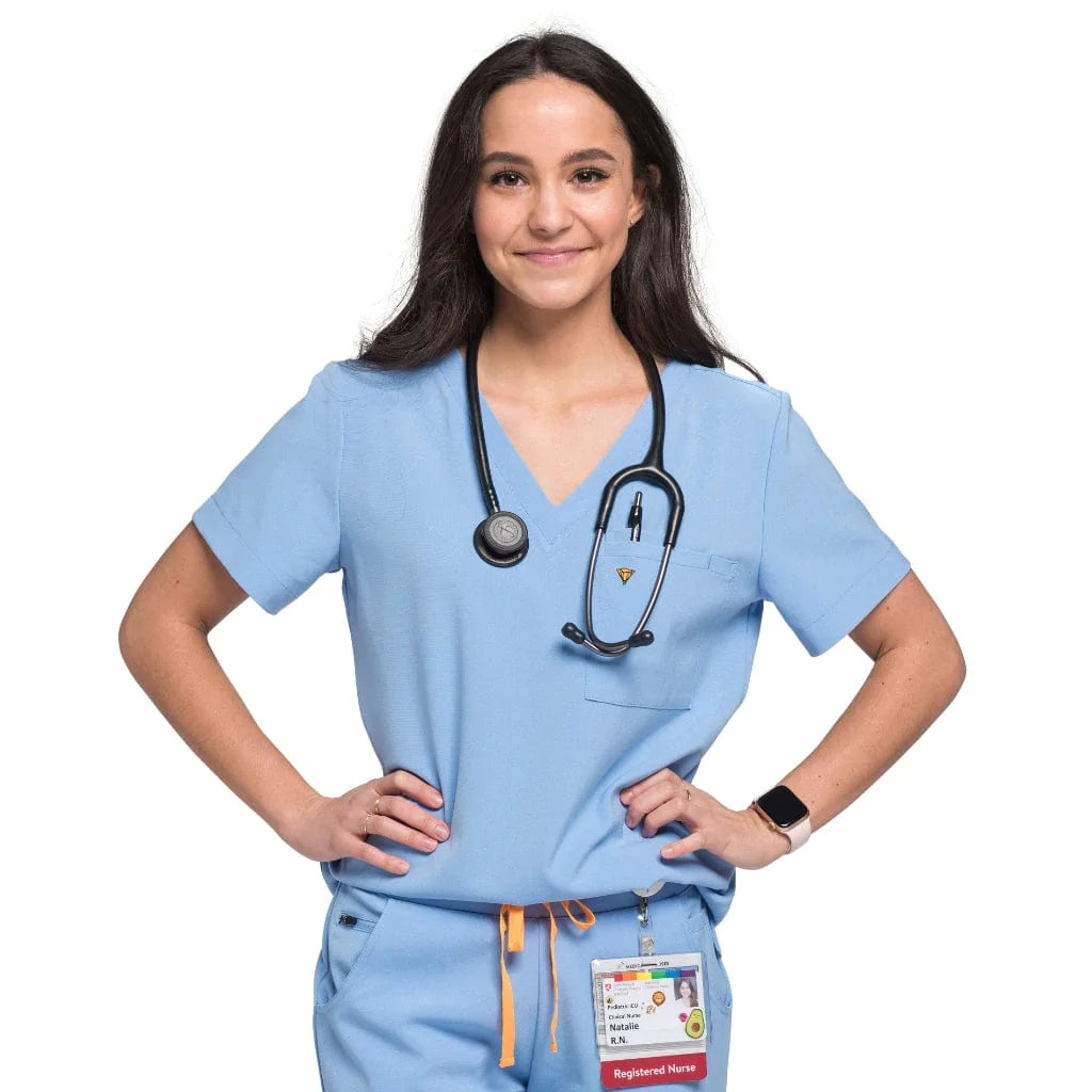 Front shot of the wilder one-pocket scrub top in ceil blue.