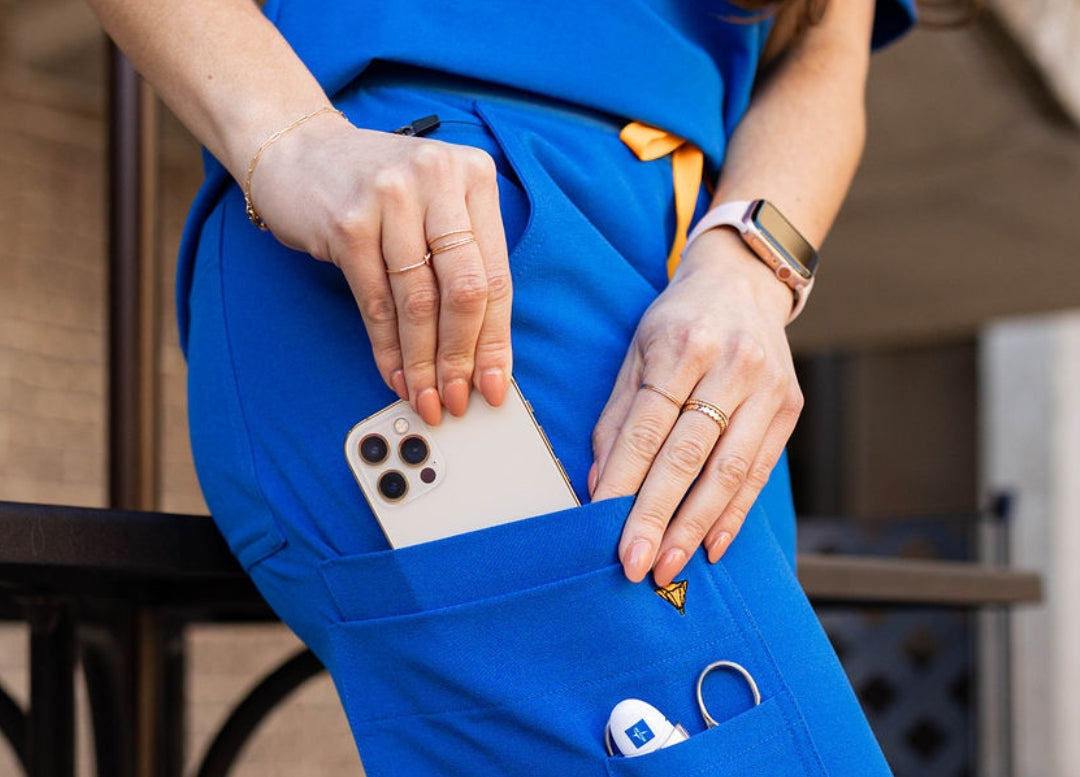 Pocket detail of women's scrub pants.