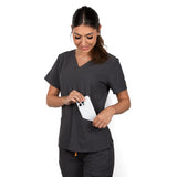 Upper front picture of the pockets on the Caswell scrub top in charcoal gray.