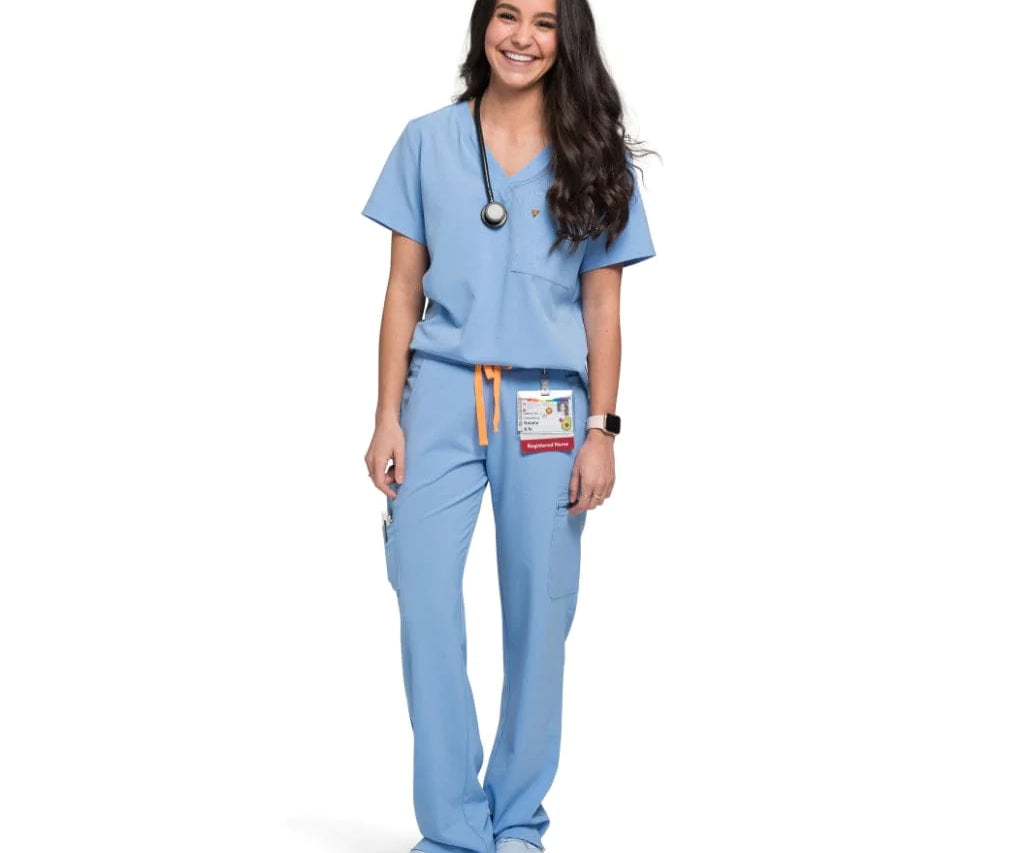 Full body picture of the the Bodie scrub pants in ceil blue.