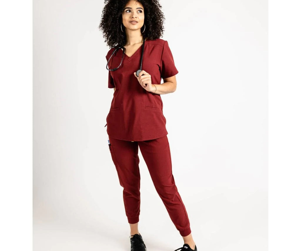 Full body picture of the the Hatton jogger scrub pants in burgundy.