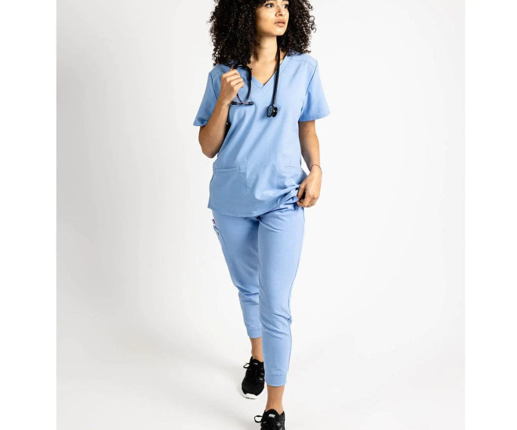 Full body picture of the the Hatton jogger scrub pants in ceil blue.