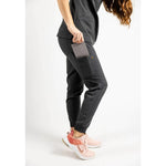 Side pocket detail picture of the the Hatton jogger scrub pants in charcoal gray.