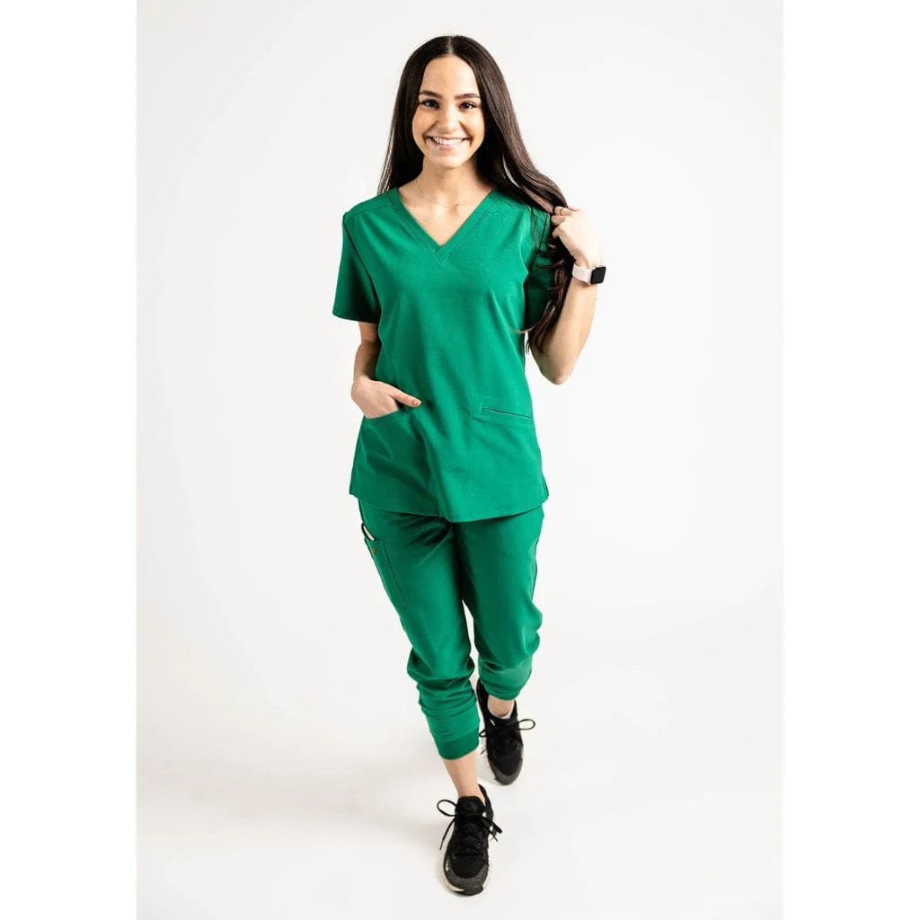 Full body picture of the the Hatton jogger scrub pants in hunter green.