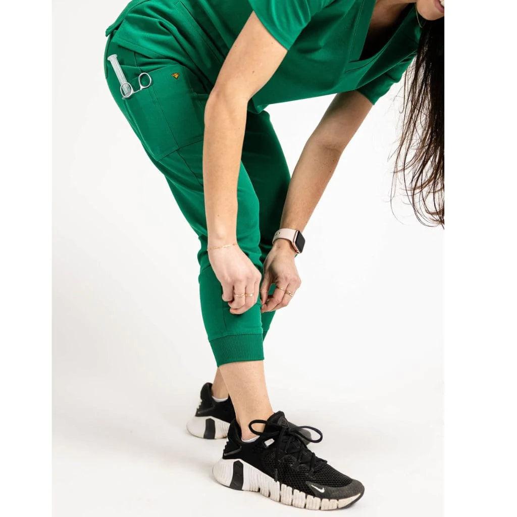 Lower detail picture of the the Hatton jogger scrub pants in hunter green.