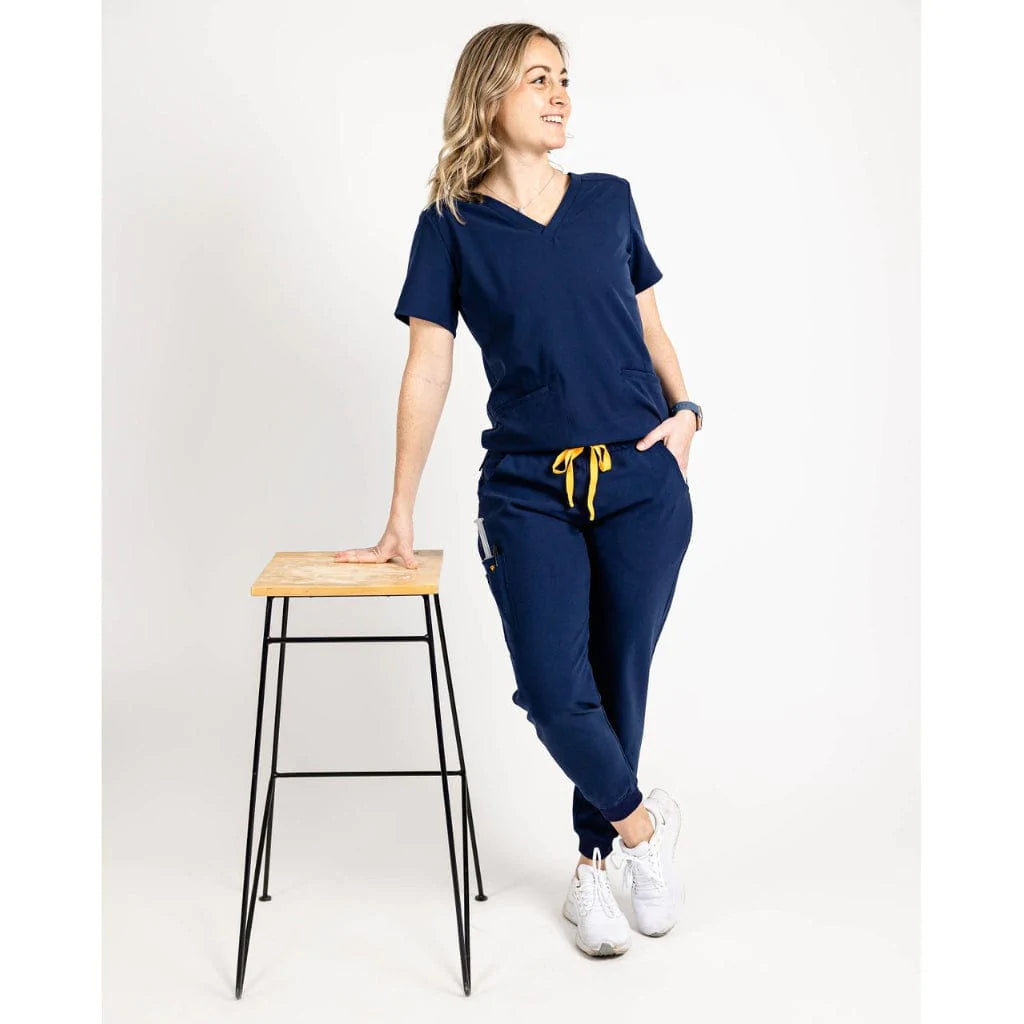 Full body picture of the the Hatton jogger scrub pants in navy blue.