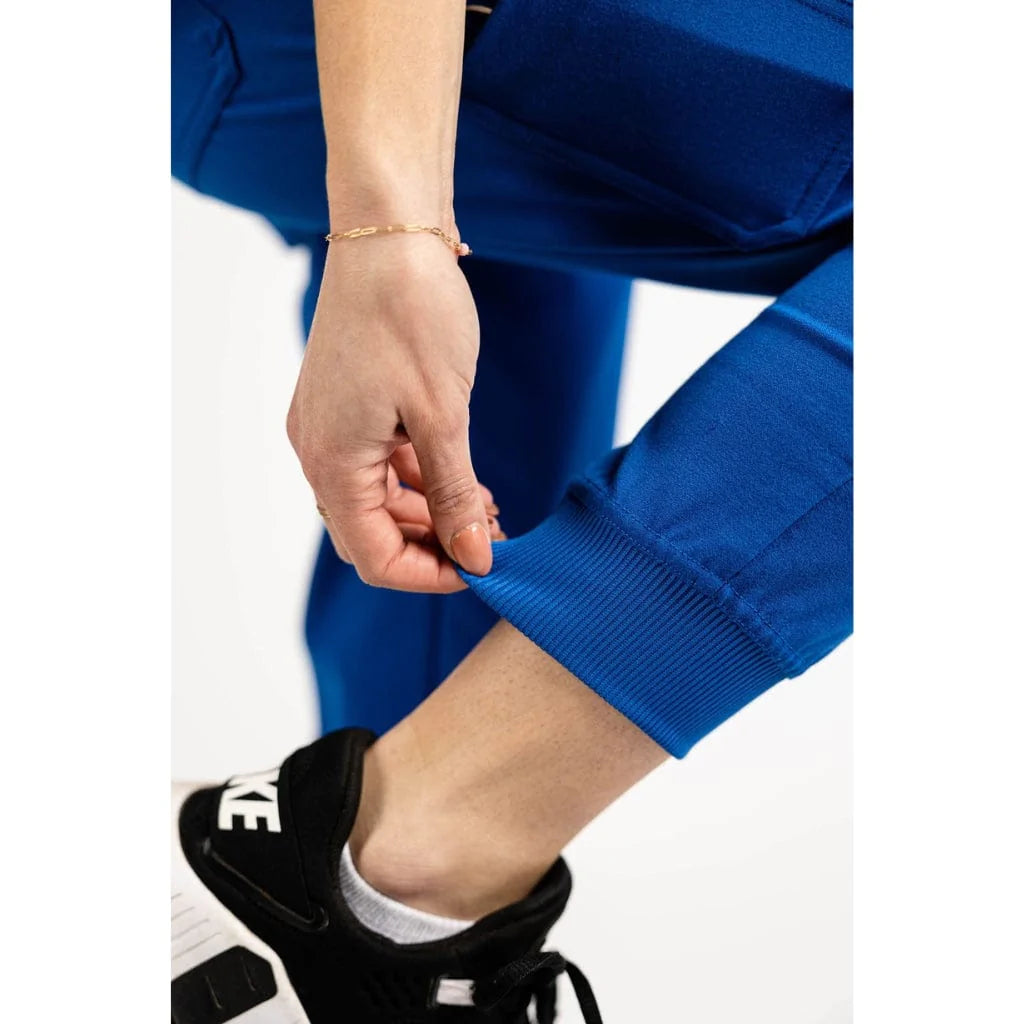 Ankle cuff detail picture of the the Hatton jogger scrub pants in royal blue.