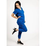 Side full body picture of the the Hatton jogger scrub pants in royal blue.
