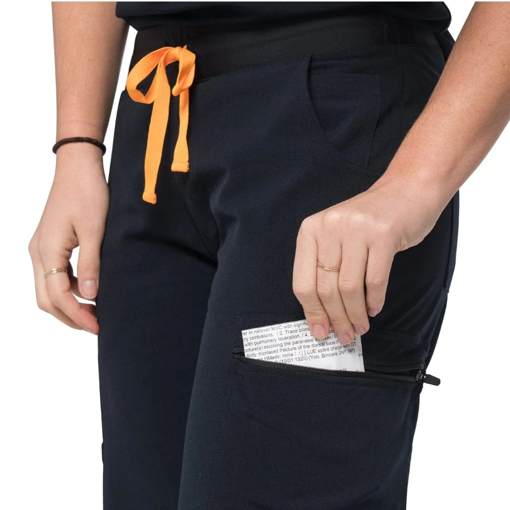 Lower front pocket detail picture of the the Pfeiffer scrub pants in black.