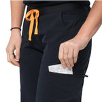 Lower front pocket detail picture of the the Pfeiffer scrub pants in black.