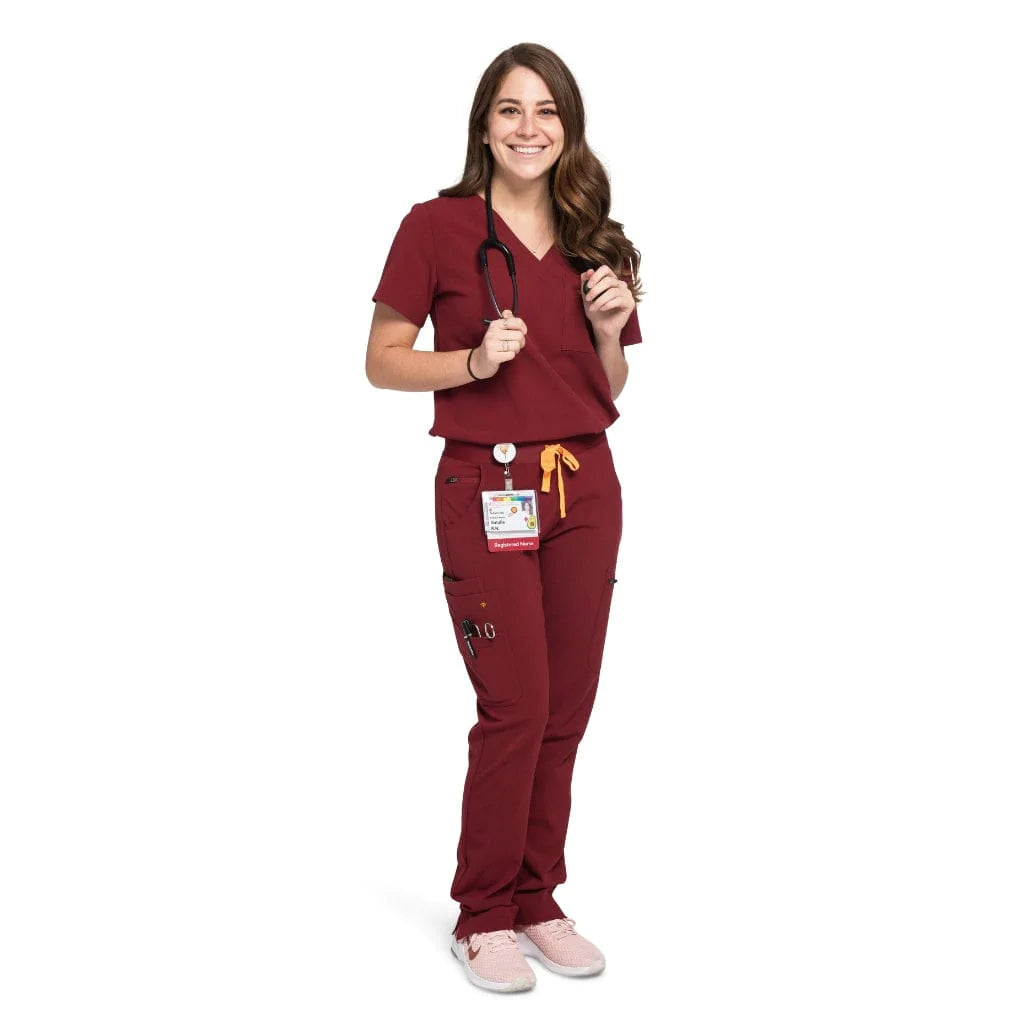 Full body picture of the the Pfeiffer scrub pants in burgundy.