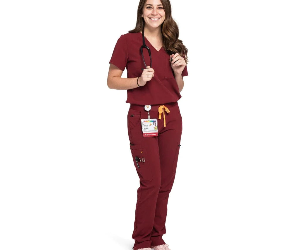 Full body picture of the the Pfeiffer scrub pants in burgundy.