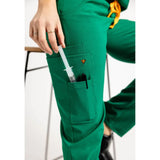 Lower front pen pocket detail picture of the the Pfeiffer scrub pants in hunter green.