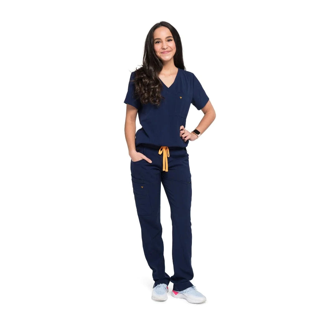 Full body picture of the the Pfeiffer scrub pants in navy blue.