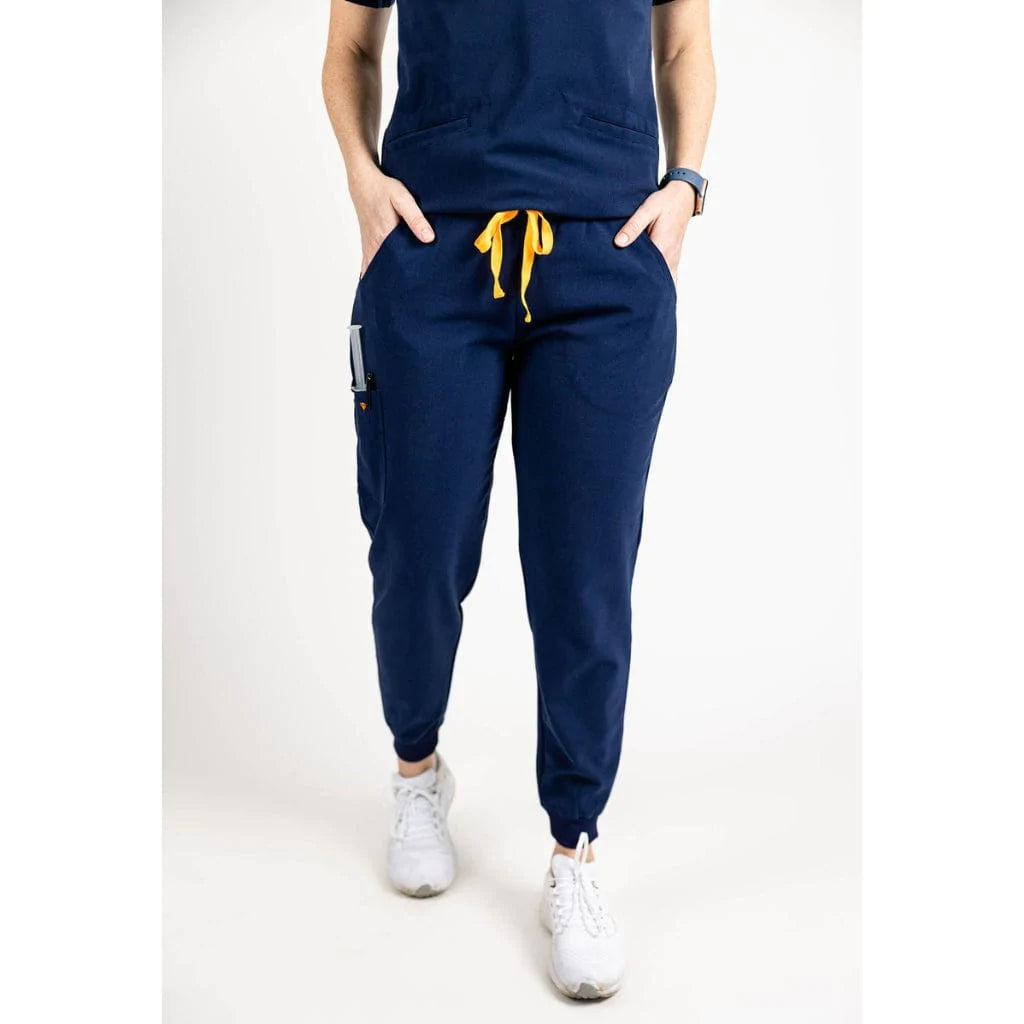 Lower body picture of the the Hatton jogger scrub pants in navy blue.