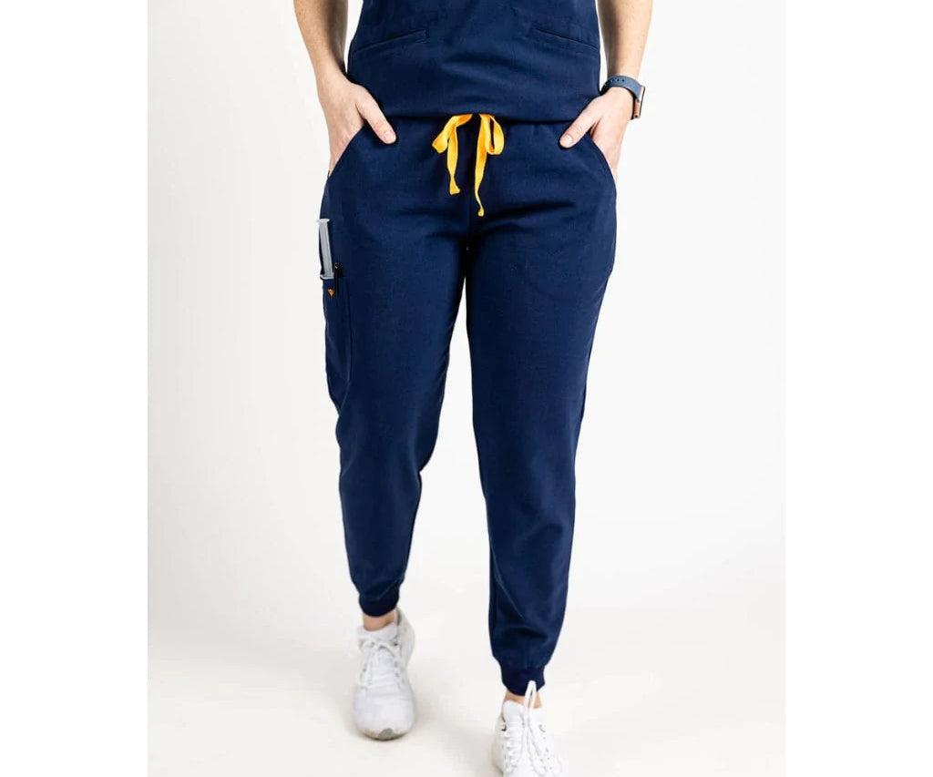 Lower body picture of the the Hatton jogger scrub pants in navy blue.