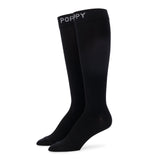 Standing detail photo for premium black compression socks.