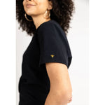 Sleeve detail picture of the the Caswell scrub top in black.