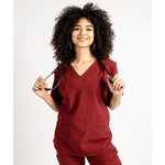 Upper front picture of the the Caswell scrub top in burgundy.