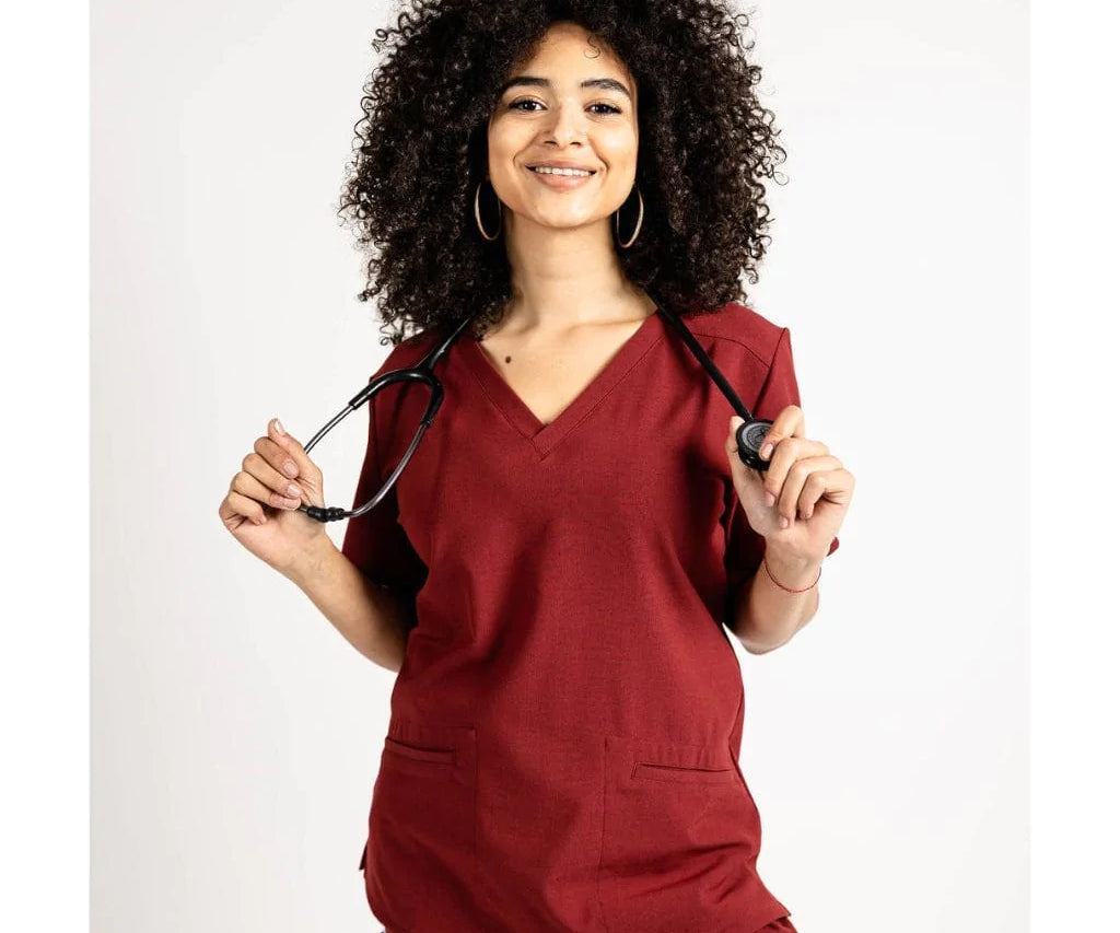 Upper front picture of the the Caswell scrub top in burgundy.