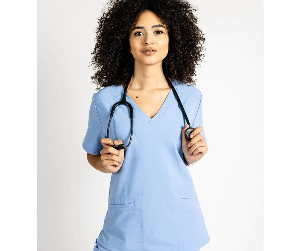 Upper front picture of the the Caswell scrub top in ceil blue.