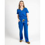 Full body picture of the wilder one-pocket scrub top in royal blue.