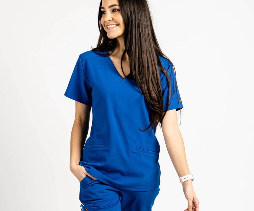 Upper front picture of the the Caswell scrub top in royal blue.