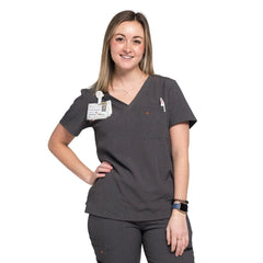 Front shot of the wilder one-pocket scrub top in charcoal gray.